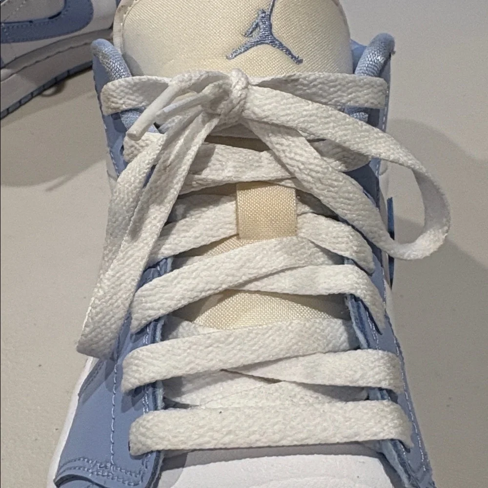 Nike - Women's Air Jordan Retro 1 Low Sneakers. White and baby blue.